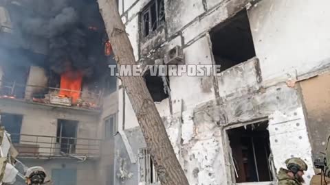 Ukraine War - Mariupol. FSVNG employees rescue a local resident.