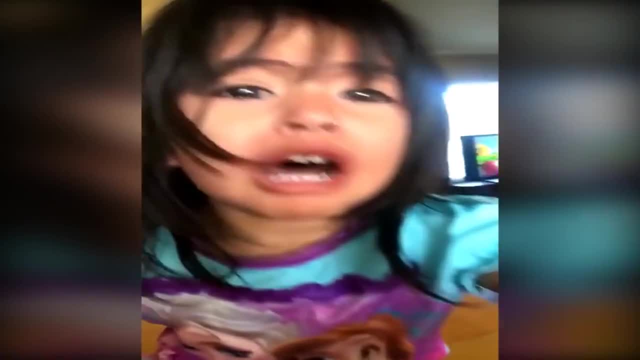 Little girl scared of pumpkin!
