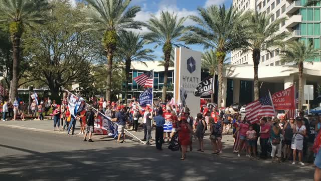 Patriots Waving Flags to Welcome President Trump and Say Thank You
