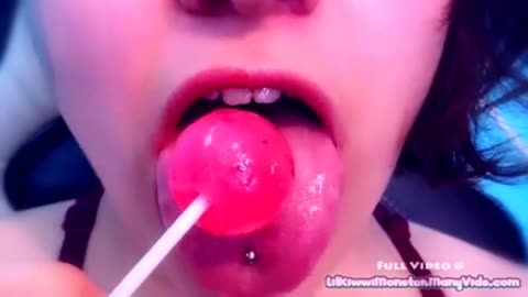 Asmr girl licks her chupa chups on camera