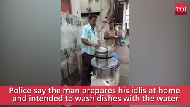 A men using water of public toilet to cook fastfood 🤢