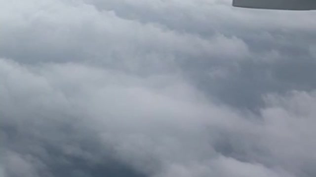 The outside world on a cloudy day on a plane.