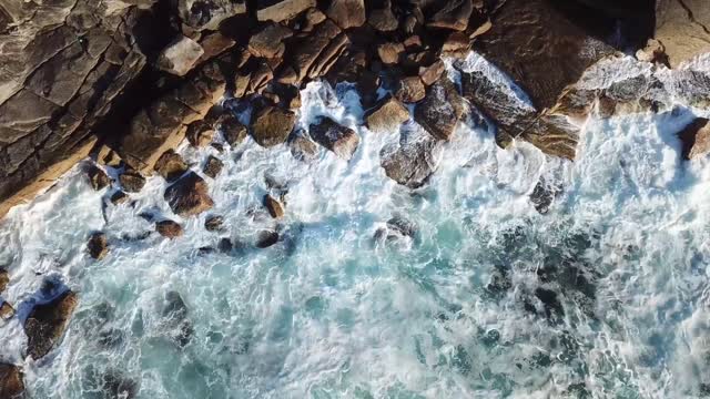 Waves crashing against rocks