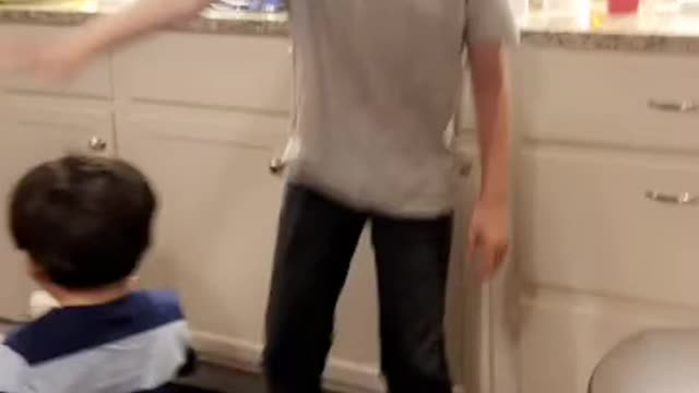 Boy dances to Macarena