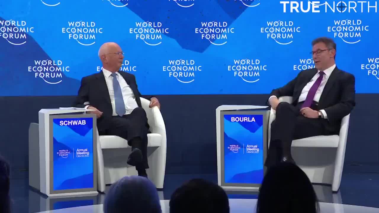 Davos: Klaus Schwab and Pfizer CEO Albert Bourla laugh about us 'antivaxxers' *See Description*