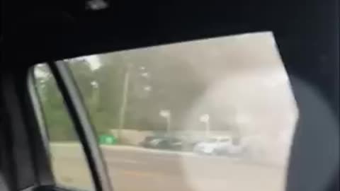 Tornado sends truck flying across road()