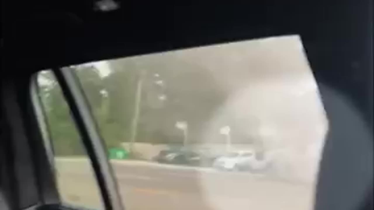 Tornado sends truck flying across road()