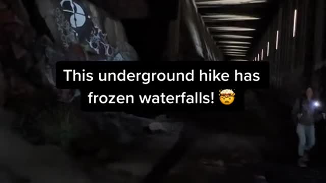 This underground hike has frozen waterfalls!