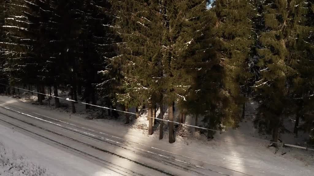 Drone flying through the icy mountains