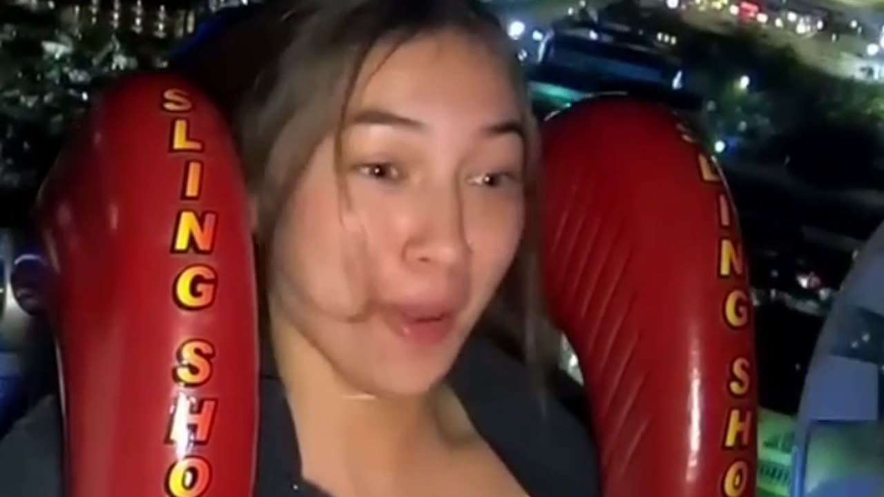 Beautiful asian girl on a slingshot!!!, her top almost come off!!!