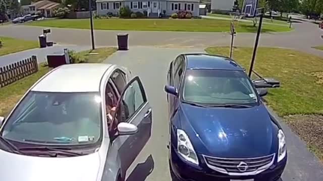 Driver Forgets to Put Car in Park and Takes Out Garage Door