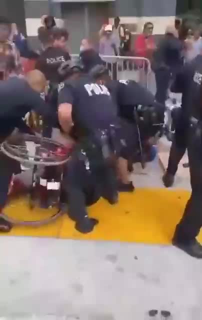 Austrian "Vaccine" Police in action against man in wheelchair