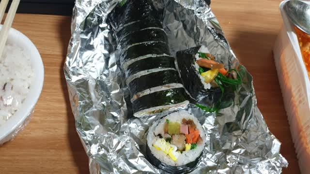 Delicious Korean food - kimbap and soft tofu.