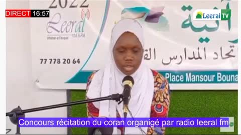 African Lady Reciting Qur'an