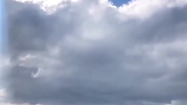 A wonderful and amazing view of an eagle flying in the sky catching a fish