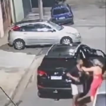 A security camera captures the moment in which a military policeman savagely beats his wife.