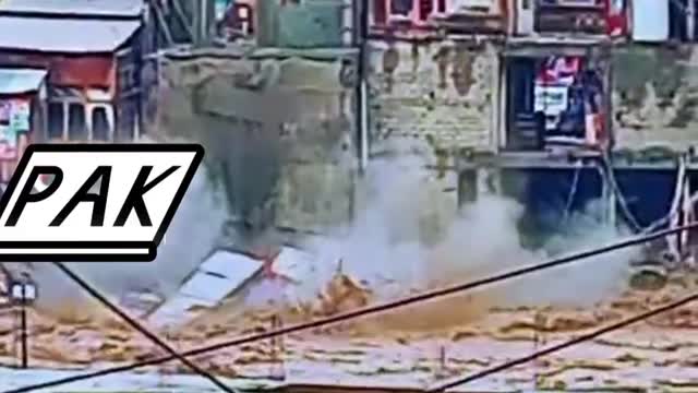 Falling of house by river