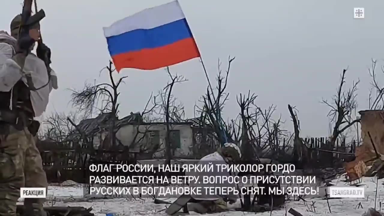 The Russian flag raised in the village Bogdanovka, northwest of Bakhmut.