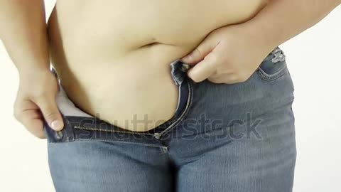 stock-footage-fat-woman-body-trying-to-put-on-her-tight-jeans.webm