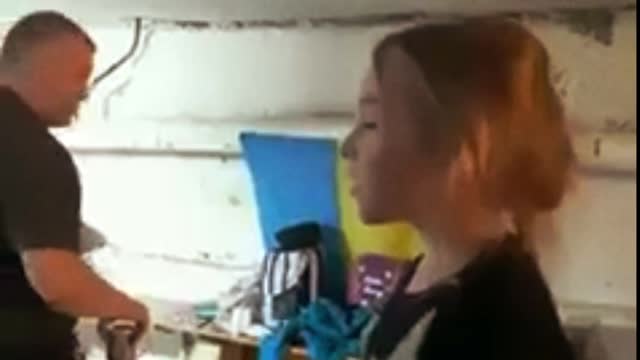 Ukrainian girl sings a localized version of "let it go" inside a bomb shelter