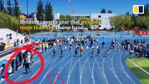 Speedy student cameraman keeps pace with sprinters in college dash in China