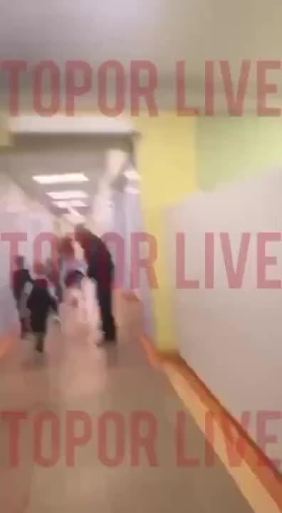 Students and Staff Flee Building Amid School Shooting In Russia