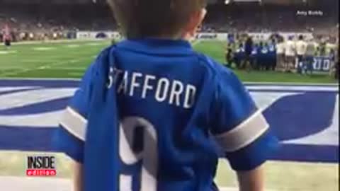 Detroit lions boy high fives