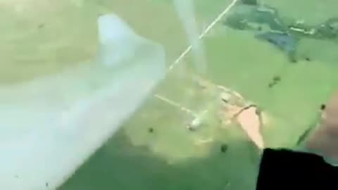 A pilot flying next to a landspout tornado during its formation