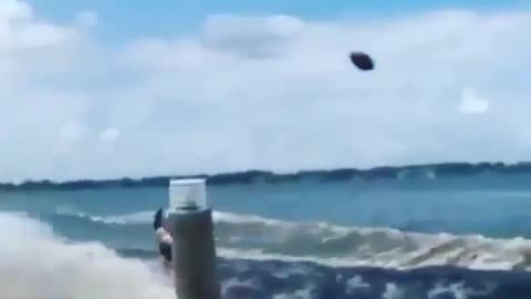 Catch a ball in water