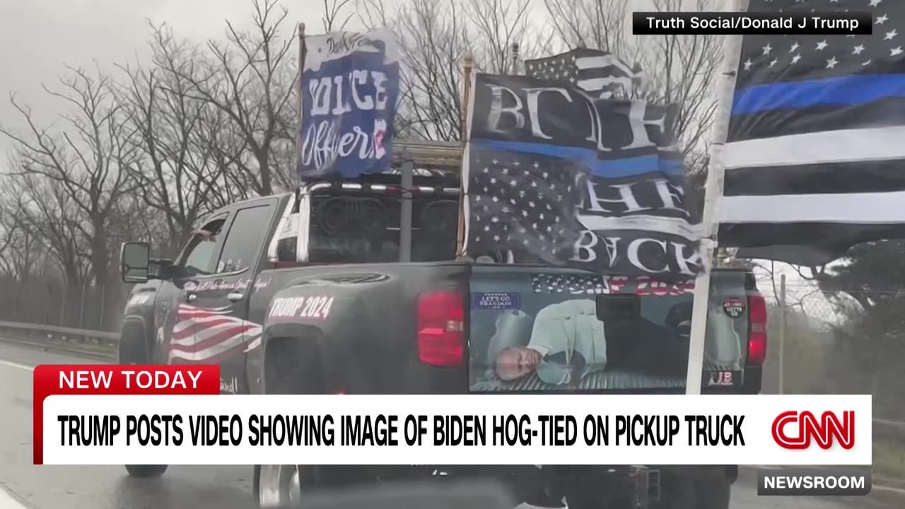 Trump posts video that shows image of Biden tied up in the back of a truck