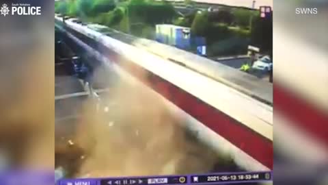 CCTV footage captures moment drunk driver smashes Range Rover into train at level crossing