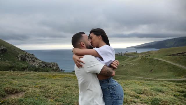 Couple Making Love In The Meadows