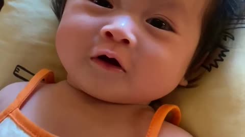 Baby try to speak with Dad