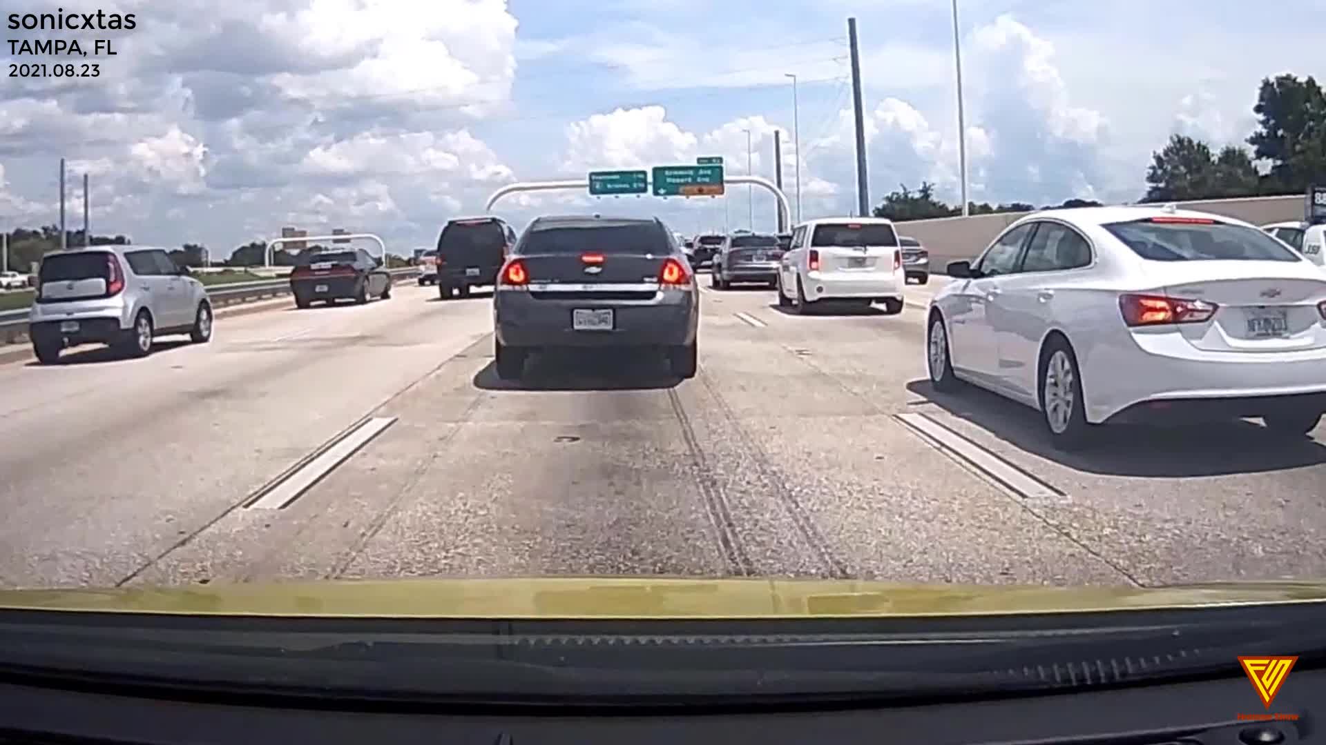 Lady drives erratically, bumps and car on the highway and runs 2021.08. ...