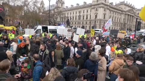 Protesters in the U.K Today chant at the front of Parliament to arrest Boris Johnson