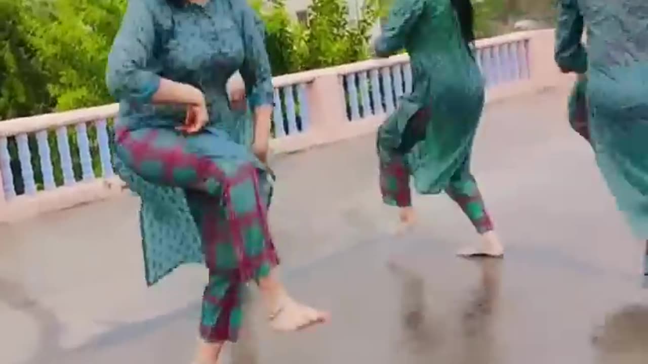 Five Sisters Dancing and Enjoying in the Rain