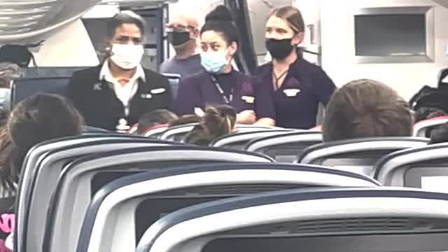 Cursing Couple Escorted Off Flight