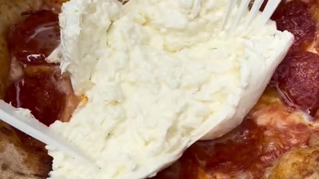 burrata-topped pepperoni pizza at the @US Open this year from San Matteo Pizzeria e Cucina