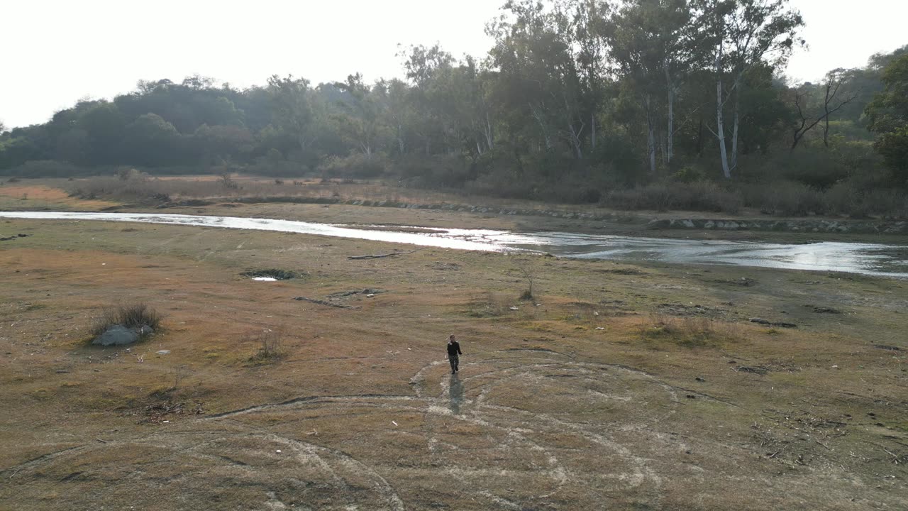 Little angel daching under drone camera