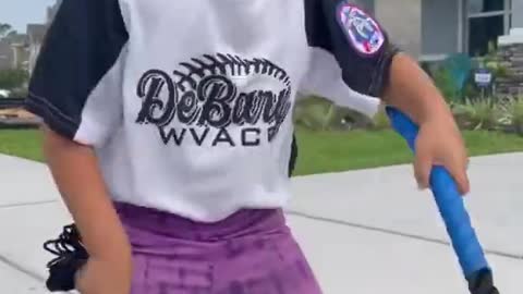 Kid Does Battle Ropes Exercise While Dad Motivates Her