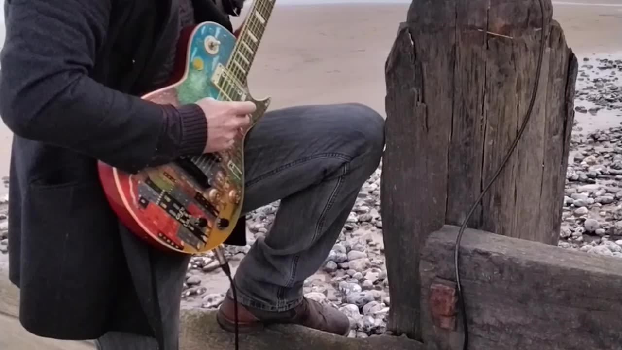 Playing Guitar at the Beach