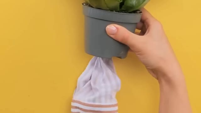 Make flower vases from leftover clothes