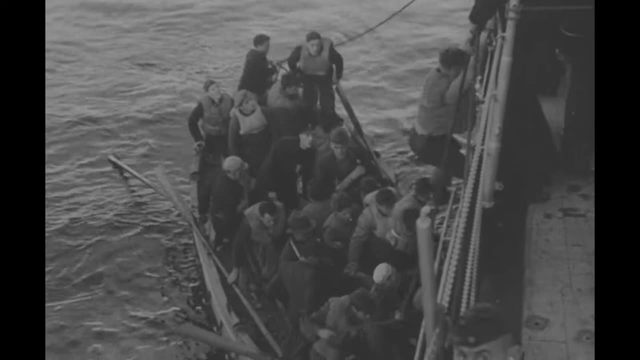 HMS Jervis Bay taking fire from heavy cruiser Admiral Scheer while escorting Convoy HX 84