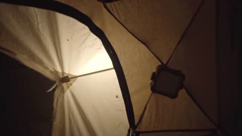 A tent was set up beside the fish pond to camp