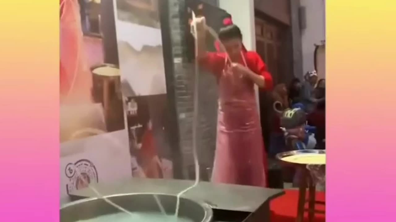 Skillful Chinese Women making Noodles