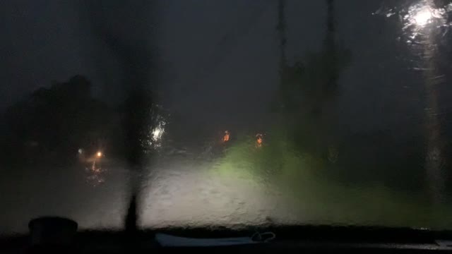 Lightning Strikes Near Moving Car