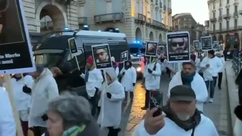 The protestors hold memorial for victims of COVID vaccine