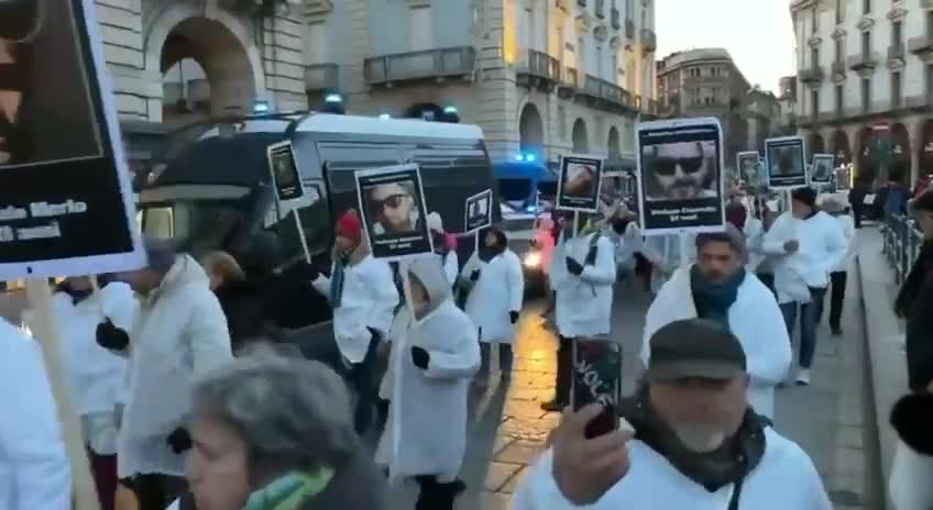 The protestors hold memorial for victims of COVID vaccine