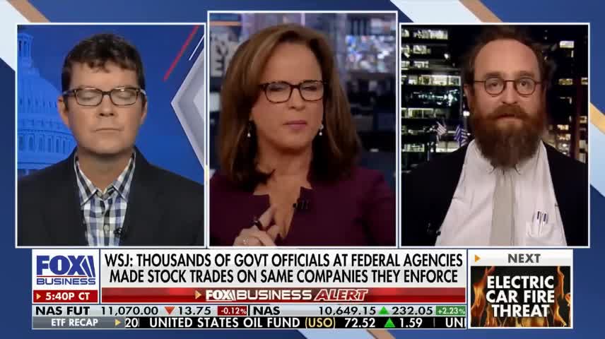 How did federal officials use loophole to own stock in companies they regulate?