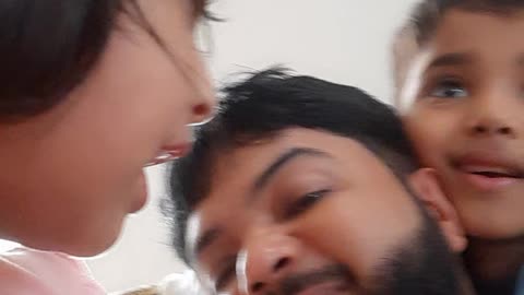 May baby boy and baby daughter hugging me